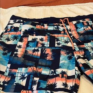 Men's Round Tree & Yorke Swim Trunks with Tropical Print